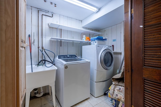 29 Meadow Ln, Chappaqua, NY 10514 - laundry room with washing machine and clothes dryer and tile patterned flooring