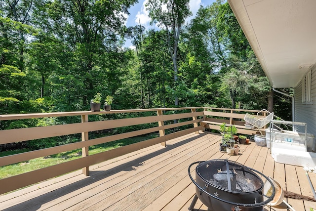 29 Meadow Ln, Chappaqua, NY 10514 - wooden deck with an outdoor fire pit
