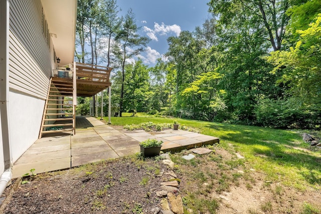 29 Meadow Ln, Chappaqua, NY 10514 - view of grassy yard featuring stairway, a patio area, and a wooden deck