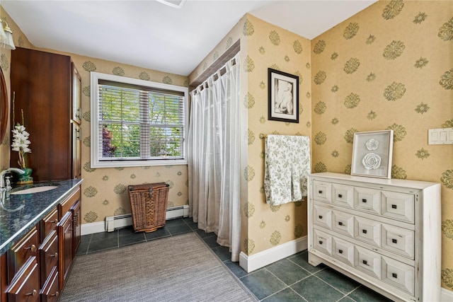 42 Roxen Rd, Rockville Centre, NY 11570 - bathroom with wallpapered walls, vanity, a baseboard heating unit, tile patterned flooring, and curtained shower
