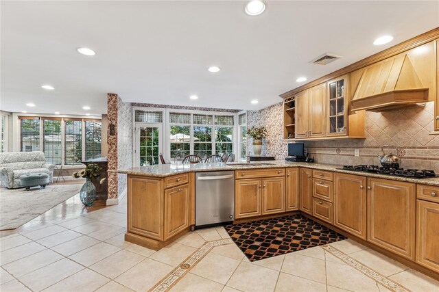 42 Roxen Rd, Rockville Centre, NY 11570 - kitchen featuring dishwasher, tasteful backsplash, light stone countertops, a peninsula, and recessed lighting