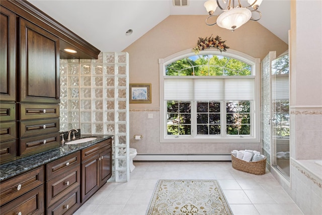 42 Roxen Rd, Rockville Centre, NY 11570 - full bathroom featuring baseboard heating, tile walls, a chandelier, lofted ceiling, and vanity