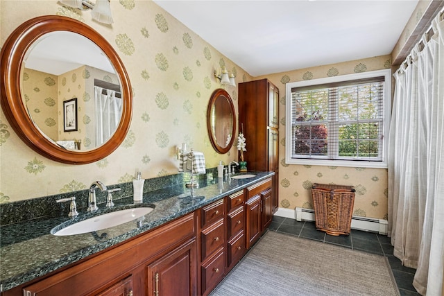 42 Roxen Rd, Rockville Centre, NY 11570 - bathroom featuring baseboard heating, tile patterned floors, double vanity, and wallpapered walls