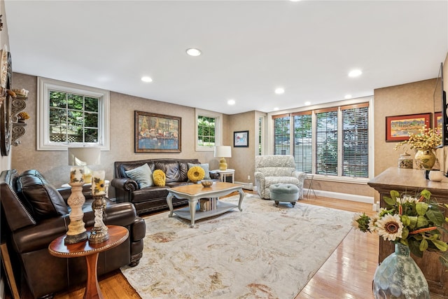 42 Roxen Rd, Rockville Centre, NY 11570 - living room featuring wood finished floors and recessed lighting