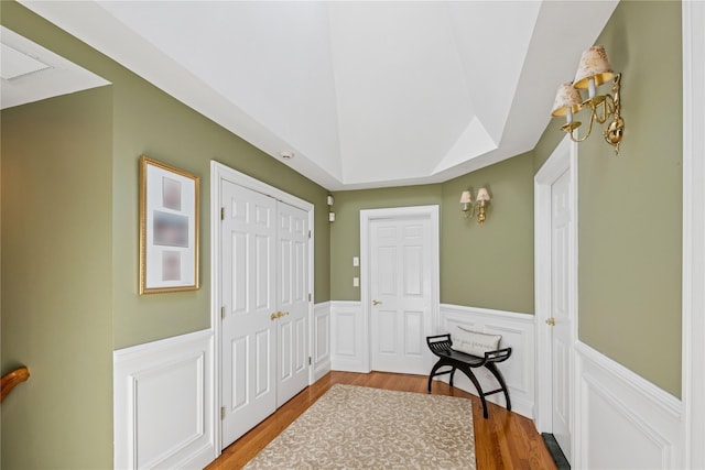 42 Roxen Rd, Rockville Centre, NY 11570 - foyer entrance featuring wainscoting and wood finished floors