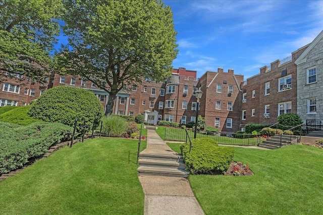 104 S Village Ave S Unit 1F, Rockville Centre, NY 11570 - view of home's community featuring a yard