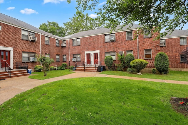 160-54 Willets Point Blvd Unit 4-206, Whitestone, NY 11357 - view of front of house with a front lawn, brick siding, and cooling unit