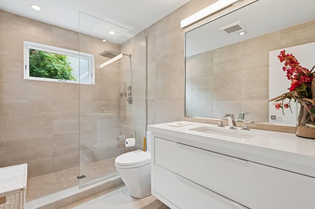 55C Shore Rd, Shelter Island, NY 11964 - full bath with walk in shower, tile walls, vanity, and recessed lighting