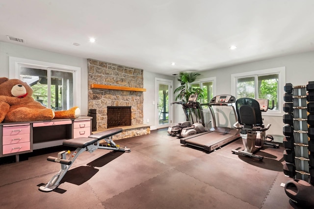55C Shore Rd, Shelter Island, NY 11964 - workout area with recessed lighting and a stone fireplace