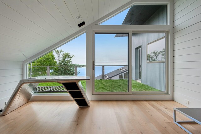 55C Shore Rd, Shelter Island, NY 11964 - unfurnished sunroom featuring a water view and vaulted ceiling