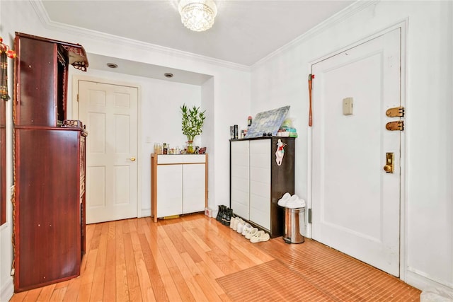 141-15 28th Ave Unit 1G, Flushing, NY 11354 - entrance foyer with light wood finished floors and crown molding
