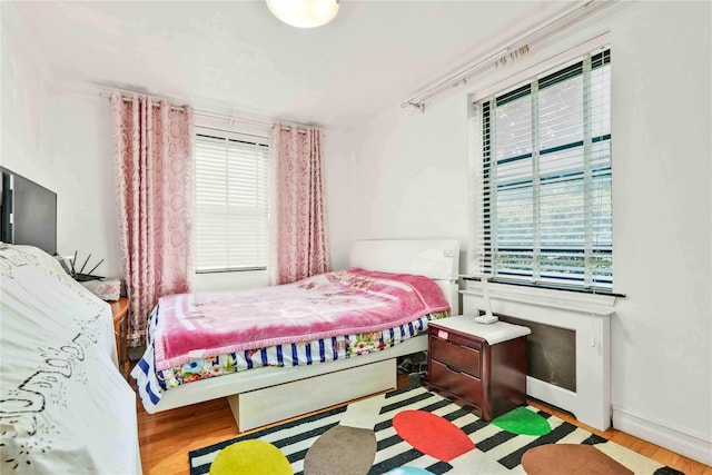 141-15 28th Ave Unit 1G, Flushing, NY 11354 - bedroom with wood finished floors and baseboards