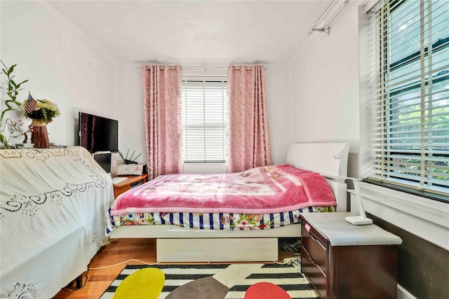 141-15 28th Ave Unit 1G, Flushing, NY 11354 - bedroom featuring ornamental molding and wood finished floors