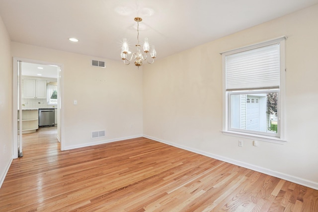 37 Baxter Rd, Pawling, NY 12564 - spare room featuring plenty of natural light, light wood-style floors, a chandelier, and recessed lighting