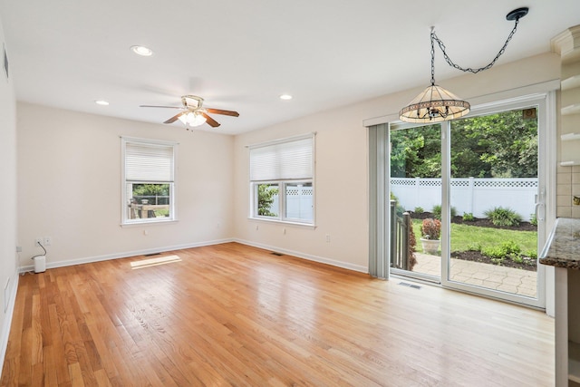 37 Baxter Rd, Pawling, NY 12564 - spare room featuring ceiling fan, recessed lighting, light wood-style flooring, and a chandelier