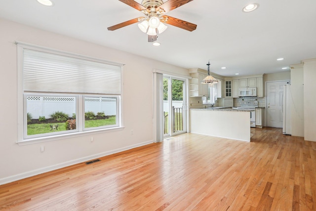 37 Baxter Rd, Pawling, NY 12564 - unfurnished living room with light wood finished floors, recessed lighting, and ceiling fan