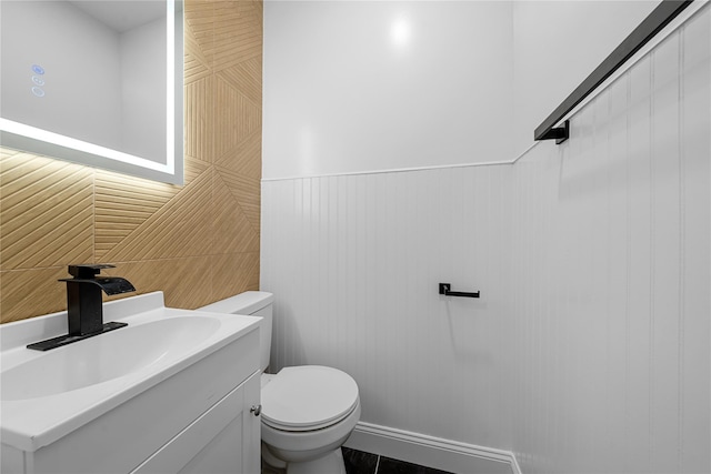 163 Grant Ave, Mineola, NY 11501 - half bath featuring vanity and a wainscoted wall