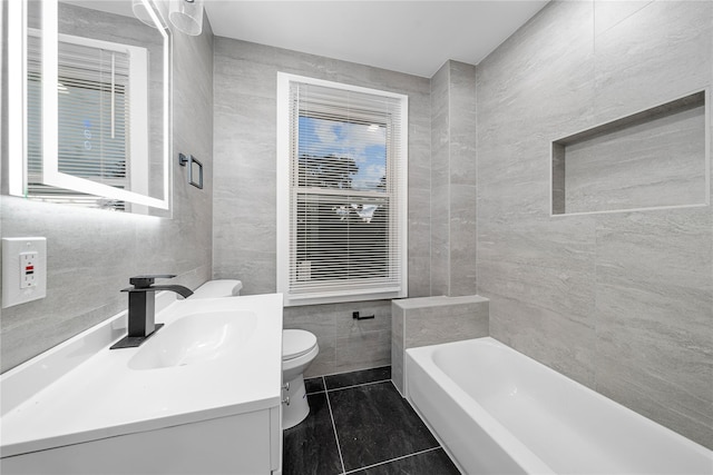 163 Grant Ave, Mineola, NY 11501 - full bath featuring tile walls, vanity, and a tub to relax in