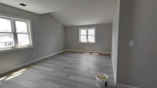 117-36 165th St, Jamaica, NY 11434 - spare room featuring lofted ceiling and wood finished floors