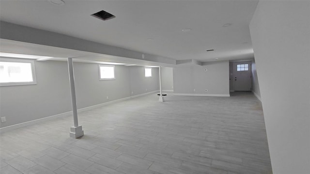 117-36 165th St, Jamaica, NY 11434 - basement featuring baseboards and light wood-style flooring