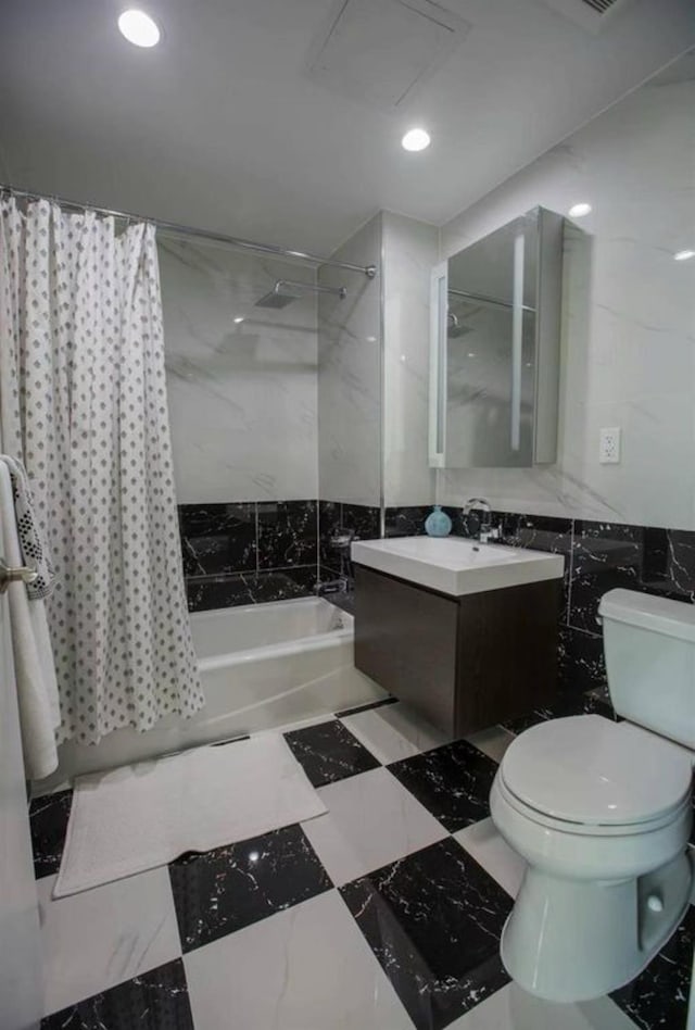 142-38 37th Ave Unit 8B, Flushing, NY 11368 - bathroom with shower / bath combo, vanity, recessed lighting, and tile walls