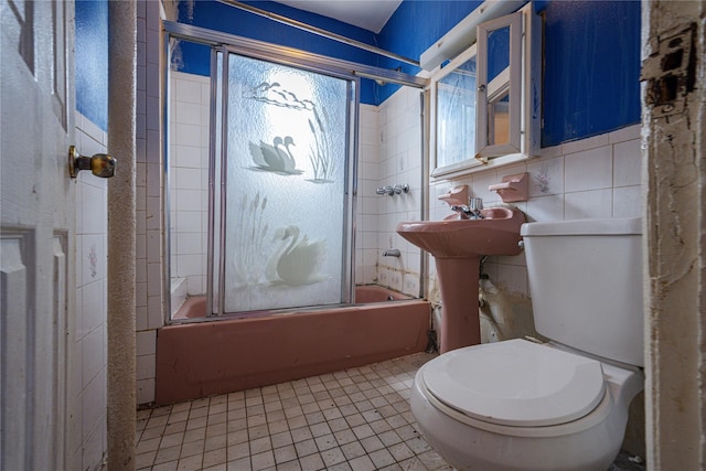 31-30 100th St, East Elmhurst, NY 11369 - full bath with enclosed tub / shower combo and tile patterned floors
