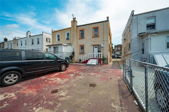 31-30 100th St, East Elmhurst, NY 11369 - back of house with a residential view