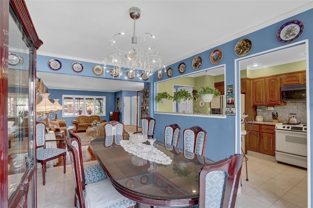 25-27 76th St, Jackson Heights, NY 11370 - dining room with light tile patterned floors and a chandelier