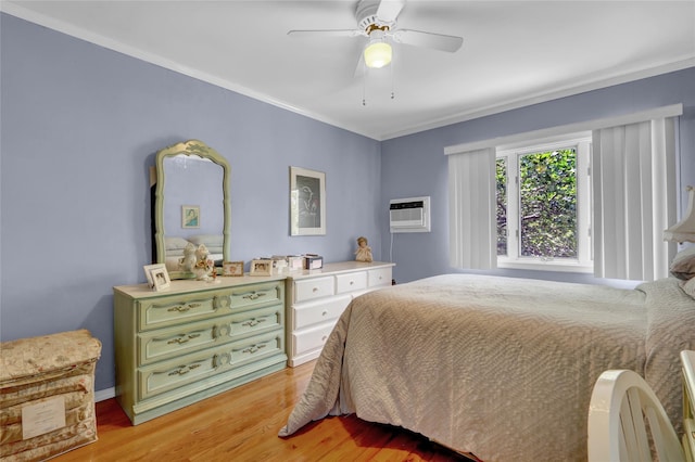 25-27 76th St, Jackson Heights, NY 11370 - bedroom featuring a wall unit AC, light wood-style flooring, ornamental molding, and a ceiling fan