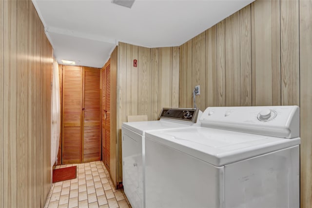 25-27 76th St, Jackson Heights, NY 11370 - laundry area with wood walls and separate washer and dryer