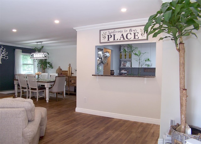 341 Thrift St, Ronkonkoma, NY 11779 - living area featuring ornamental molding, wood finished floors, and recessed lighting