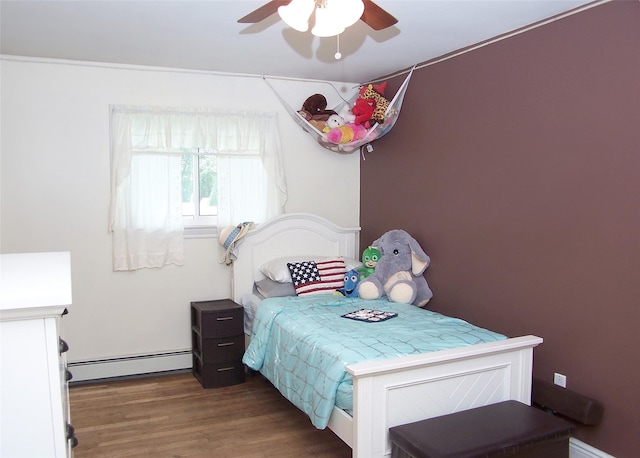 341 Thrift St, Ronkonkoma, NY 11779 - bedroom featuring baseboard heating, wood finished floors, and ceiling fan