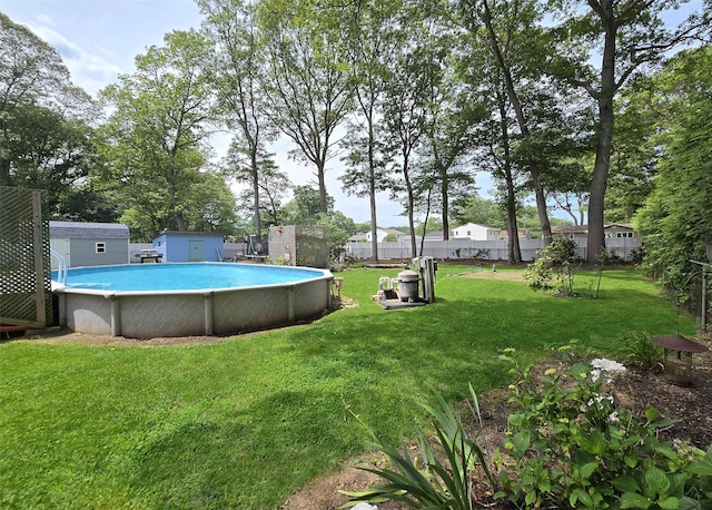 341 Thrift St, Ronkonkoma, NY 11779 - view of yard featuring an outdoor pool and a shed
