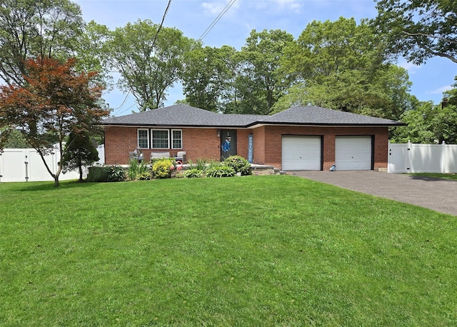 341 Thrift St, Ronkonkoma, NY 11779 - view of front facade featuring brick siding, an attached garage, driveway, and a gate