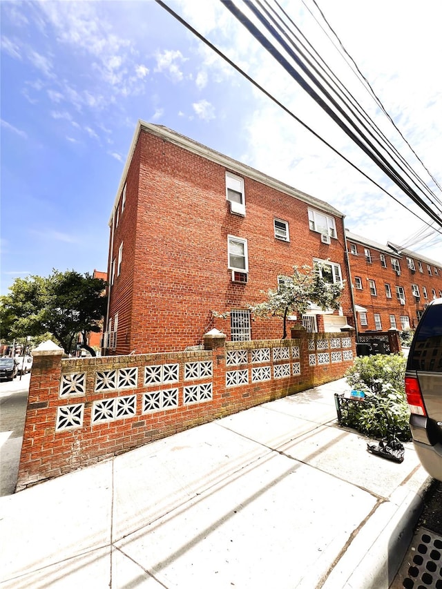 40-03 56th St, Woodside, NY 11377 - view of home's exterior featuring brick siding