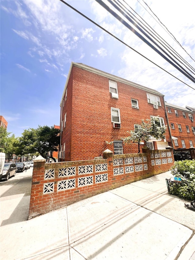 40-03 56th St, Woodside, NY 11377 - view of property exterior featuring brick siding