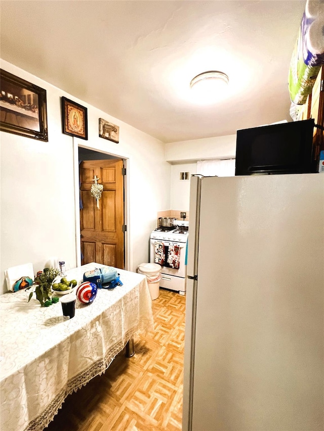 40-03 56th St, Woodside, NY 11377 - kitchen featuring white appliances