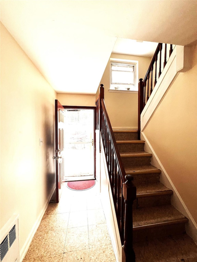 40-03 56th St, Woodside, NY 11377 - staircase featuring baseboards