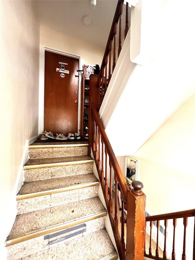 40-03 56th St, Woodside, NY 11377 - stairway featuring baseboards