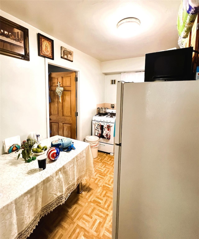 40-03 56th St, Woodside, NY 11377 - kitchen featuring white appliances