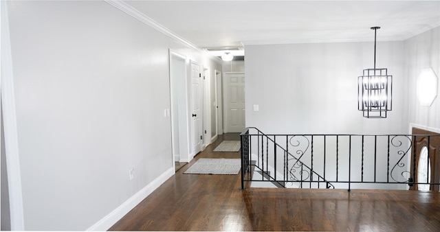 11 Boxwood Close, Hopewell Junction, NY 12533 - hallway with an upstairs landing, wood finished floors, a chandelier, and ornamental molding