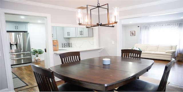 11 Boxwood Close, Hopewell Junction, NY 12533 - dining space featuring a chandelier, wood finished floors, recessed lighting, and crown molding
