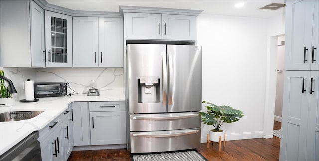 11 Boxwood Close, Hopewell Junction, NY 12533 - kitchen with stainless steel fridge with ice dispenser, dark wood finished floors, dishwasher, decorative backsplash, and glass insert cabinets