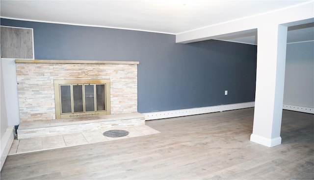 11 Boxwood Close, Hopewell Junction, NY 12533 - unfurnished living room with wood finished floors, ornamental molding, and a fireplace