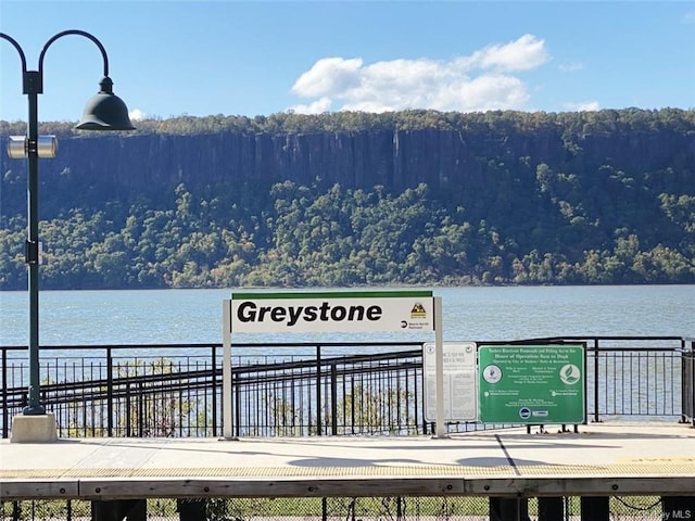 1085 Warburton Ave Unit 516, Yonkers, NY 10701 - dock featuring a wooded view and a water view
