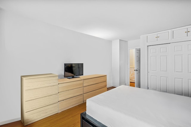 102-30 66th Rd Unit 5K, Forest Hills, NY 11375 - bedroom with a closet and wood finished floors