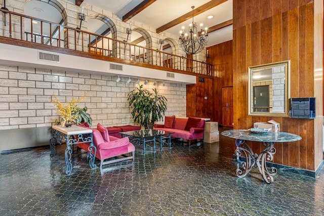 102-30 66th Rd Unit 5K, Forest Hills, NY 11375 - common area with a high ceiling, beamed ceiling, and wooden walls