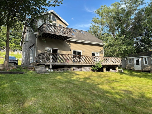 6197 State Route 42, Woodbourne, NY 12733 - rear view of house with a balcony, a yard, an outdoor structure, and a deck