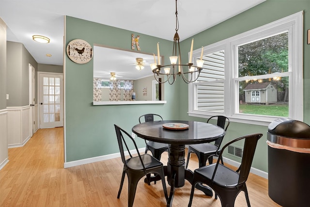 8 Argow Pl, Nanuet, NY 10954 - dining area featuring wood finished floors and a chandelier