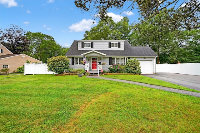 20 Grand St, New City, NY 10956 - view of front facade with driveway, a garage, and a shingled roof